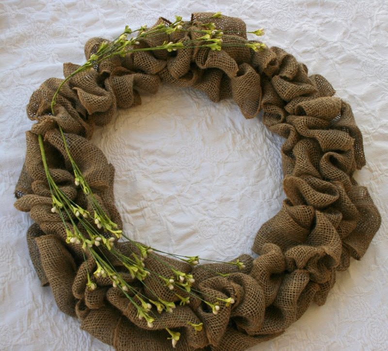 gluing flowers on wreath 