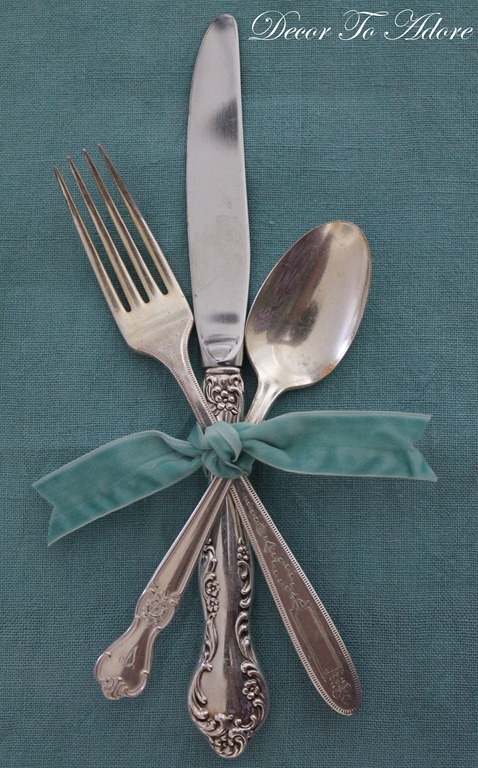 cutlery tied with ribbon