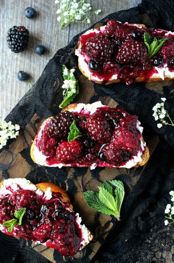 goat cheese and berries on toast