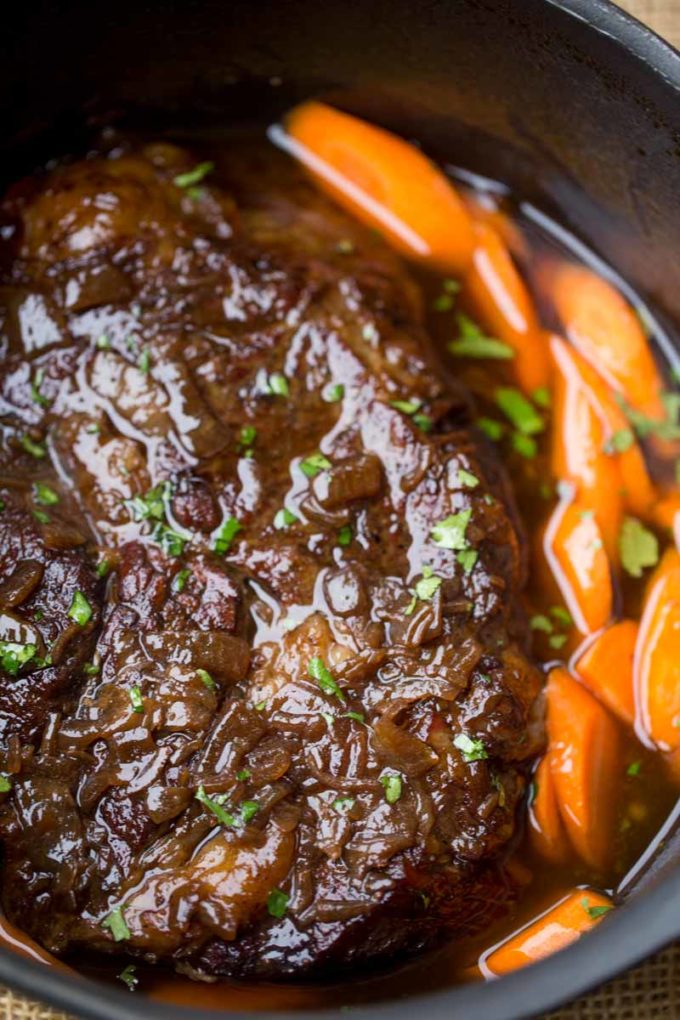 Crockpot Balsamic Pot Roast with a rich balsamic gravy and carrots and potatoes.